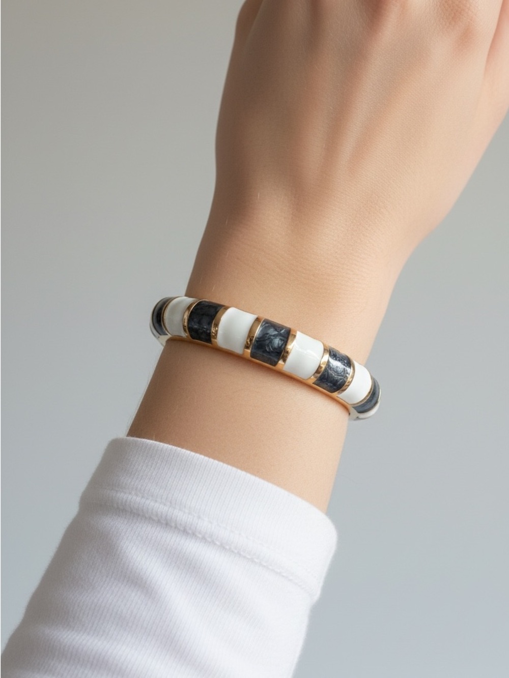 10/7 Gold-Trim Black and White Resin Bangle Bracelet
